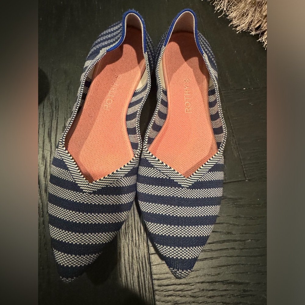 Used, pre-loved Navy and Gray Rothy's. Priced to sell. Lots of life left. 10.5